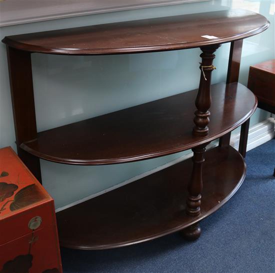A late Victorian mahogany demi lune three tier buffet, W.123cm
